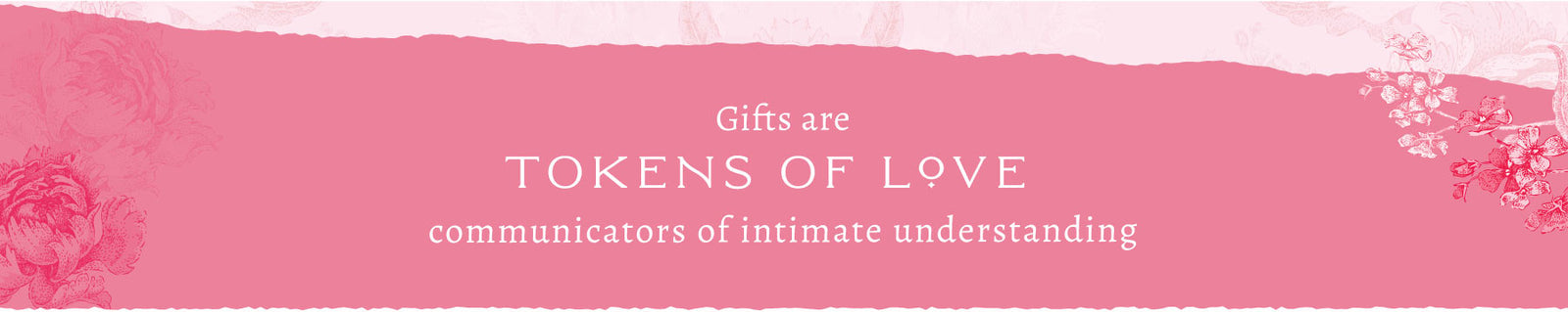 Pink banner with flowers on left and right sides with text that reads "Gifts are tokens of love, communicators of intimate understanding".